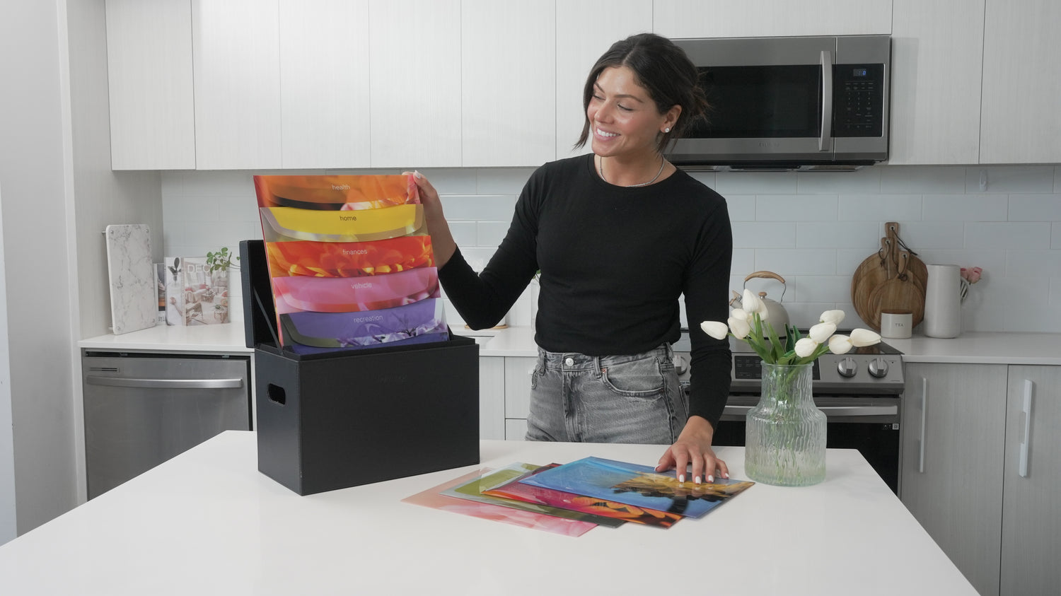 A lady organizing her files using the Homebox Filing System.